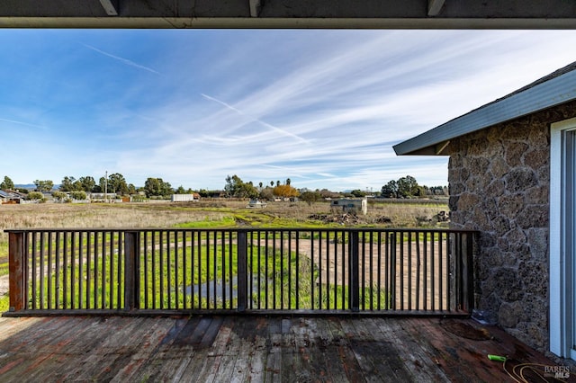 deck featuring a rural view