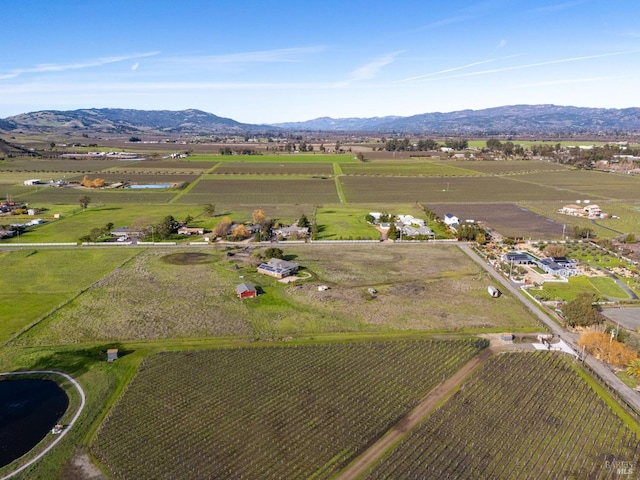 bird's eye view featuring a mountain view and a rural view