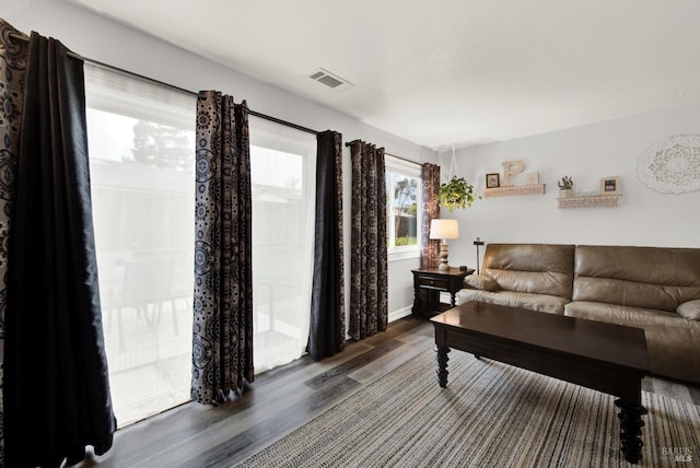 living room with dark wood-type flooring