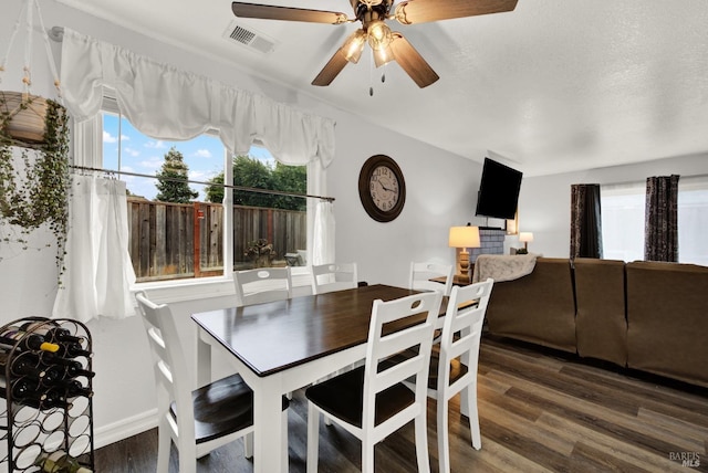 dining room featuring hardwood / wood-style flooring and ceiling fan