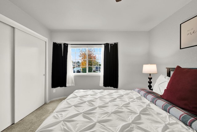 bedroom featuring light carpet