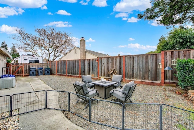 view of patio featuring a fire pit