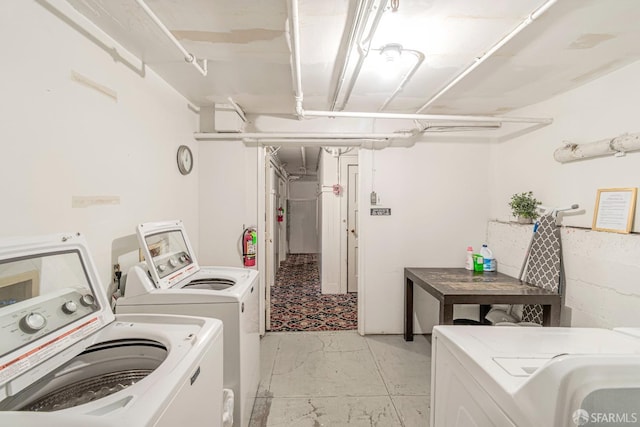 laundry area featuring separate washer and dryer