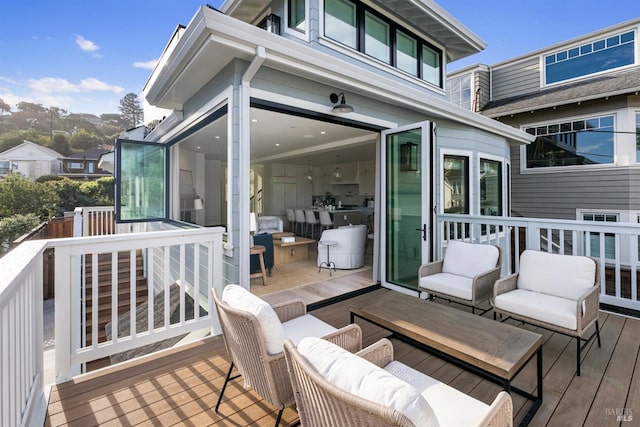 deck with an outdoor hangout area