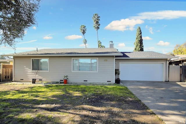 ranch-style home with a front yard and a garage