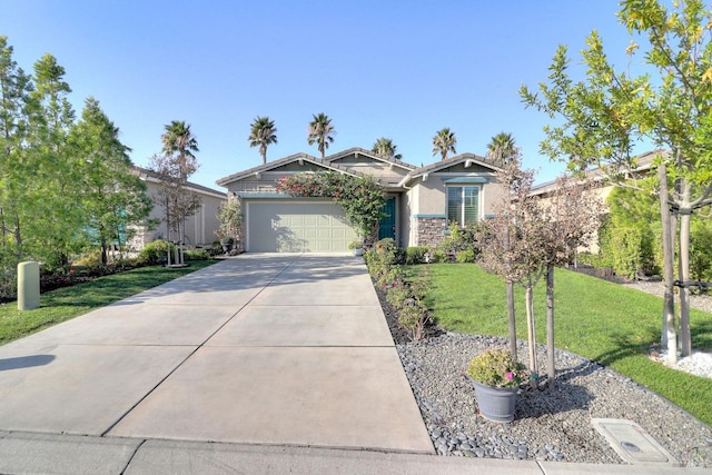 view of front facade with a garage and a front lawn