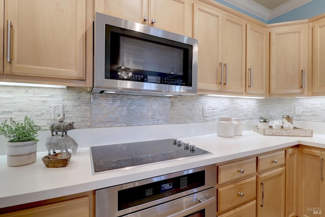 kitchen with cooktop, wall oven, tasteful backsplash, and light brown cabinets