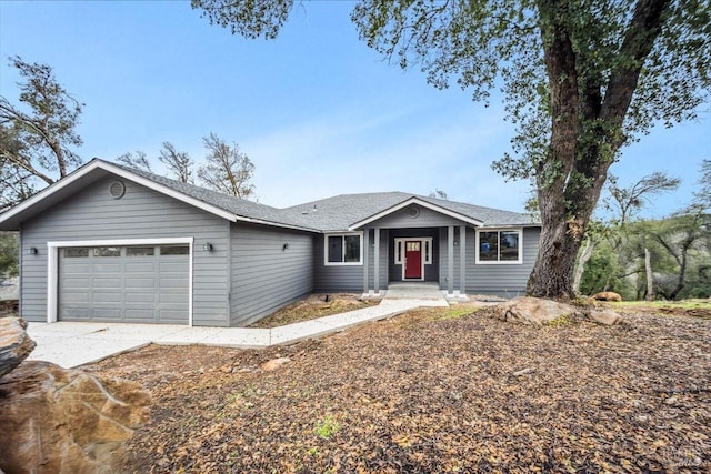 single story home with a garage