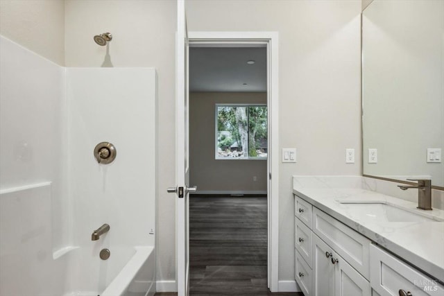 18904 Timber Point Ct, Hidden Valley Lake, CA 95467 - full bathroom with vanity, shower / tub combination, wood finished floors, and baseboards