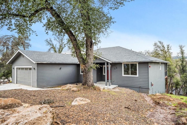 single story home with a garage