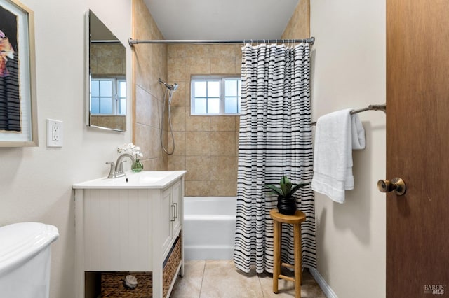 full bathroom featuring toilet, tile patterned flooring, shower / bathtub combination with curtain, and vanity