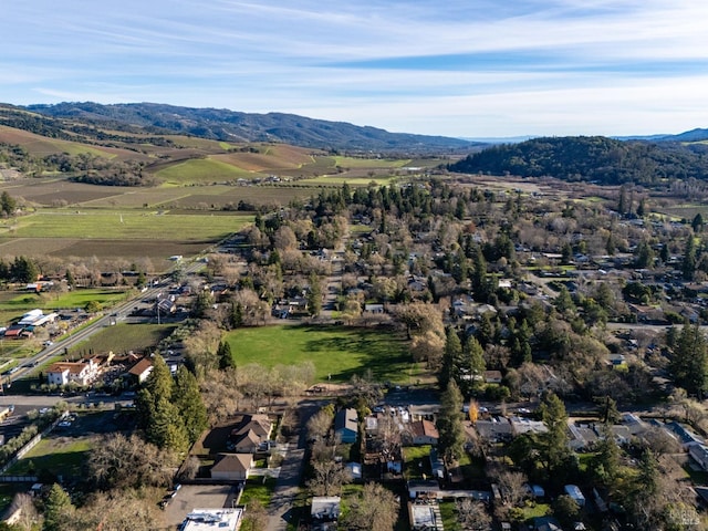 drone / aerial view with a rural view and a mountain view