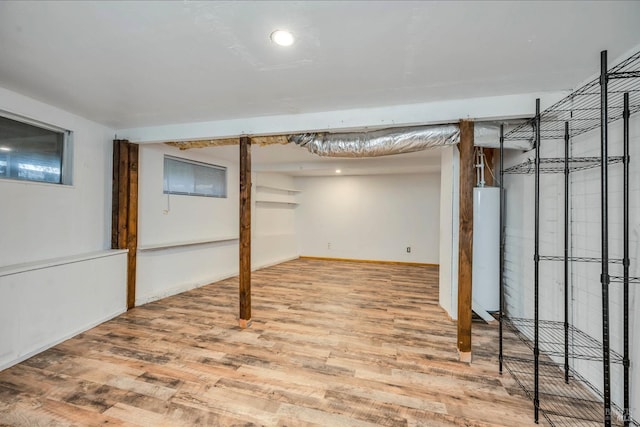 basement with wood-type flooring