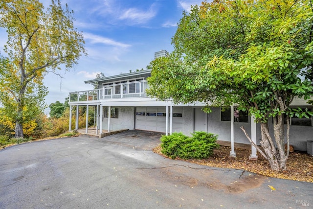 view of front of property with a garage