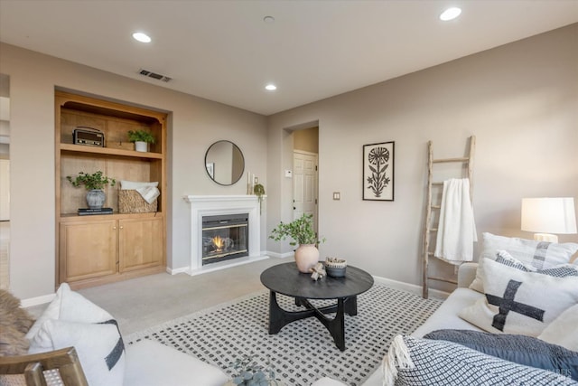 20 Oak Grove Dr, Novato, CA 94949 - living room featuring visible vents, baseboards, recessed lighting, light carpet, and a glass covered fireplace