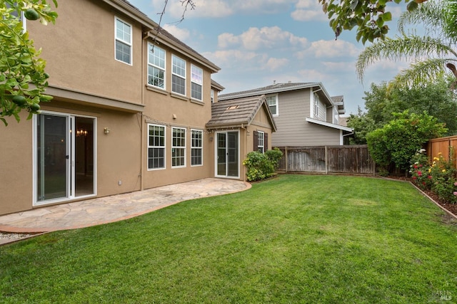 20 Oak Grove Dr, Novato, CA 94949 - rear view of property with stucco siding, a fenced backyard, a lawn, and a patio area