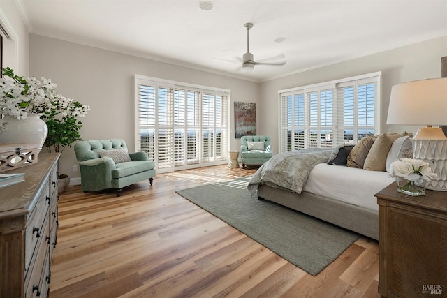 bedroom with ceiling fan, light wood-type flooring, access to exterior, and ornamental molding