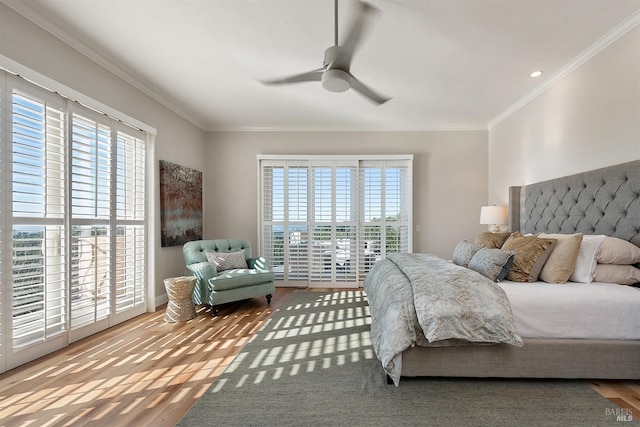 bedroom featuring ceiling fan, multiple windows, ornamental molding, and access to outside