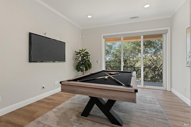 recreation room with ornamental molding, light hardwood / wood-style flooring, and billiards