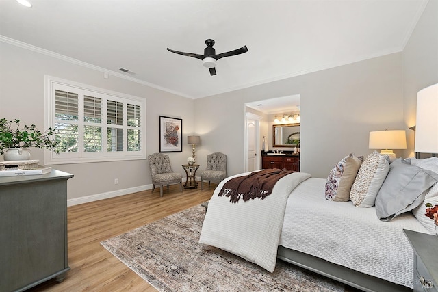 bedroom with ceiling fan, ensuite bath, ornamental molding, and light hardwood / wood-style flooring