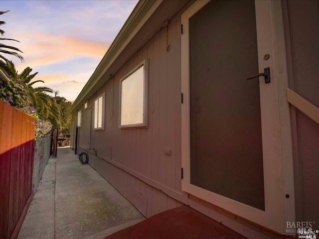 view of property exterior at dusk