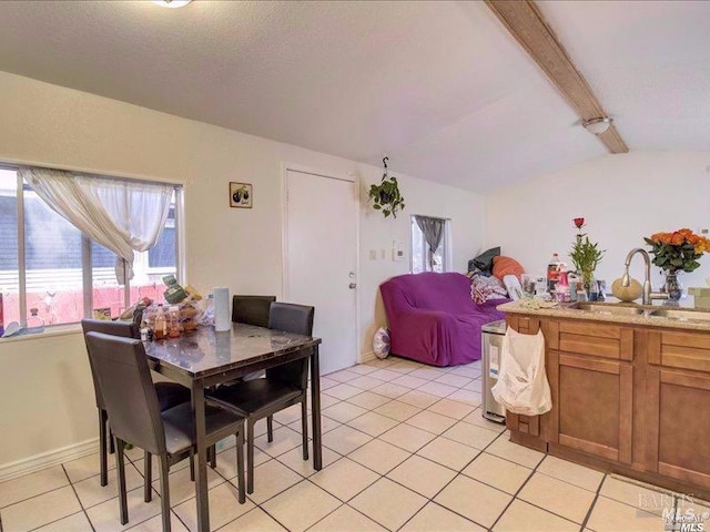 tiled dining area with sink, vaulted ceiling with beams, and wine cooler