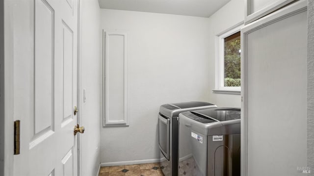 laundry room with washer and dryer