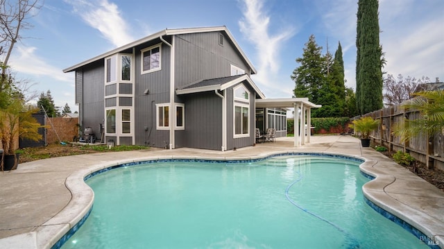 view of swimming pool featuring a patio