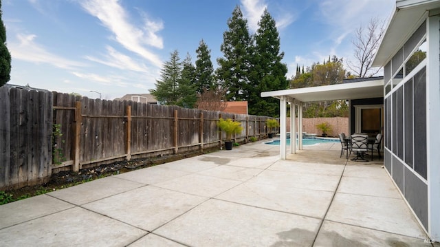 view of patio / terrace featuring a fenced in pool