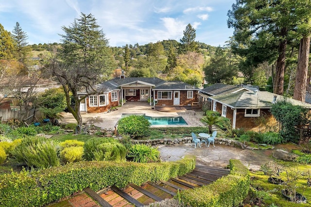 rear view of property with a patio