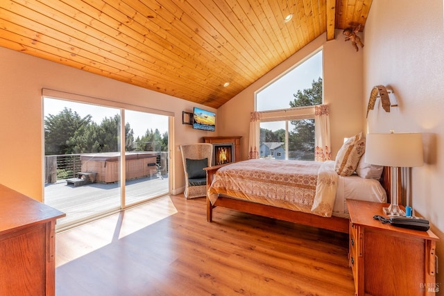 bedroom with high vaulted ceiling, wood ceiling, access to exterior, light wood finished floors, and beamed ceiling