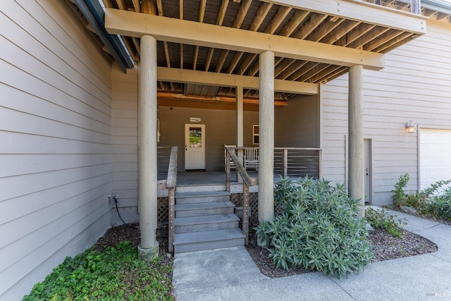 property entrance featuring covered porch