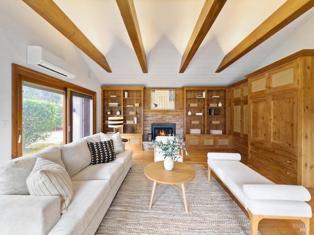 living room with built in shelves, wood-type flooring, lofted ceiling with beams, and a wall unit AC