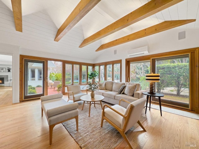 living room featuring beam ceiling, a wall mounted air conditioner, and high vaulted ceiling