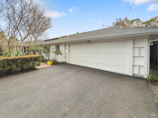 exterior space with a garage