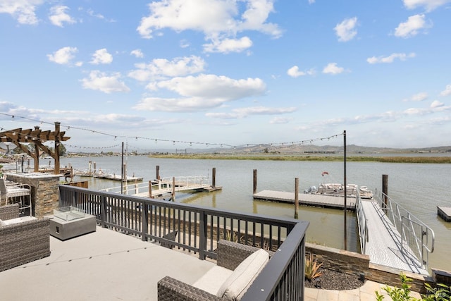 dock area with a water view