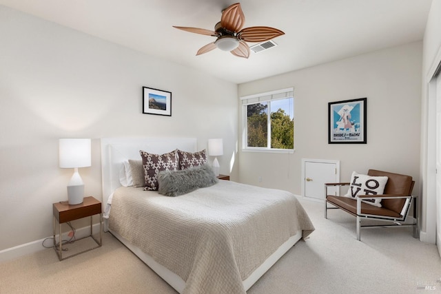 carpeted bedroom with ceiling fan