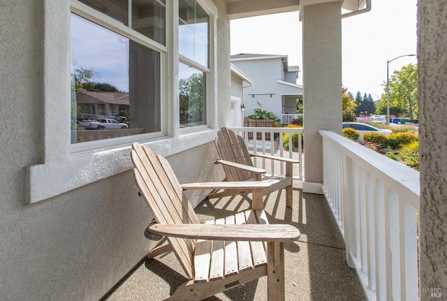 balcony featuring covered porch