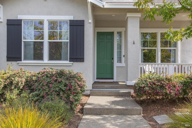 property entrance with a porch