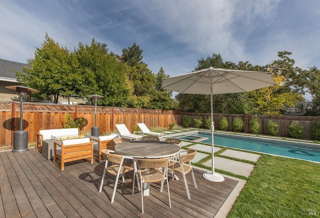 view of swimming pool featuring a wooden deck