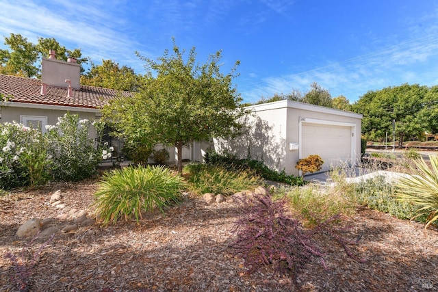 view of home's exterior with a garage