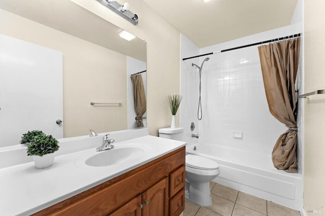 full bathroom with tile patterned flooring, vanity, shower / bath combo, and toilet