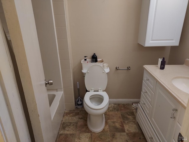 full bathroom featuring vanity, toilet, and  shower combination