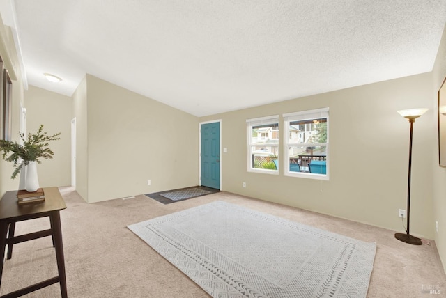 interior space featuring a textured ceiling