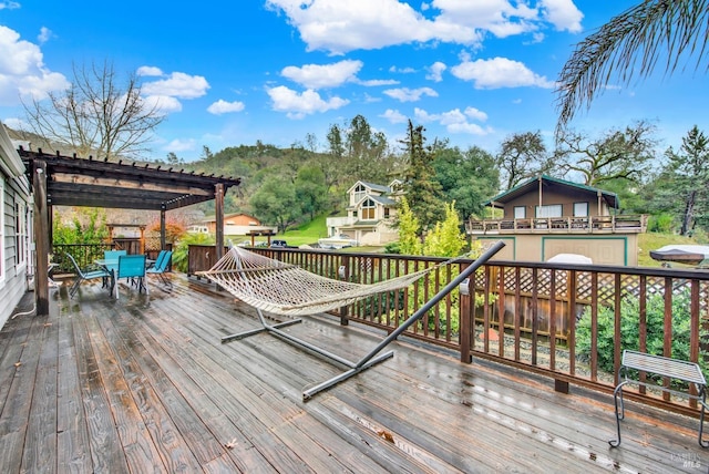 wooden terrace featuring a pergola