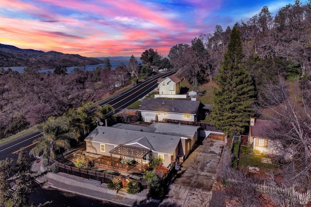 aerial view at dusk with a mountain view