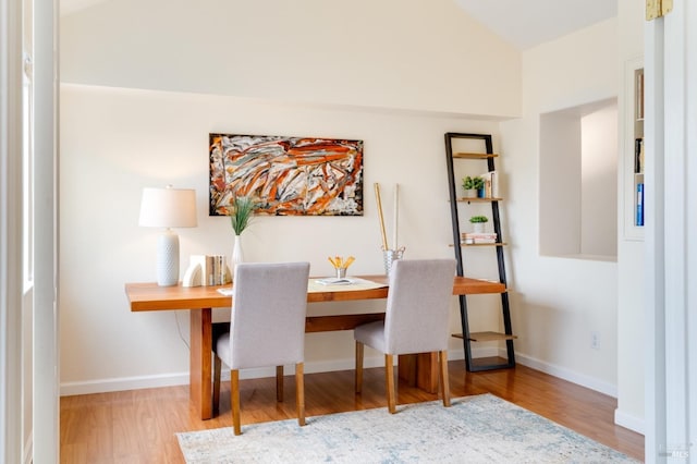 dining area featuring wood-type flooring