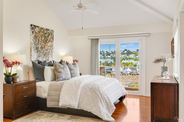 bedroom featuring access to outside, multiple windows, ceiling fan, and vaulted ceiling