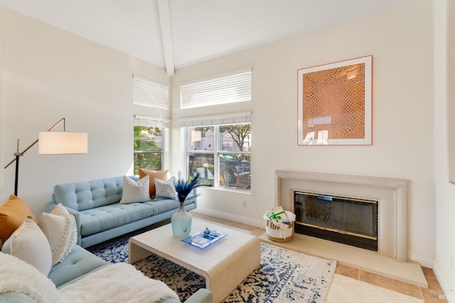 tiled living room with beamed ceiling