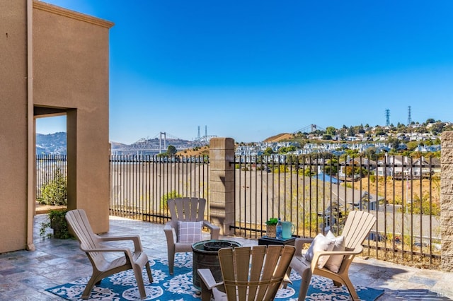 view of patio / terrace with a mountain view